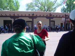 Garcia talks about the design of the Palace of the Governors during a walk around the Santa Fe Plaza.