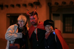 ...and some folks can't resist posing with a handsome devil.
